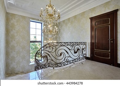 Staircase With Wrought Iron Railing