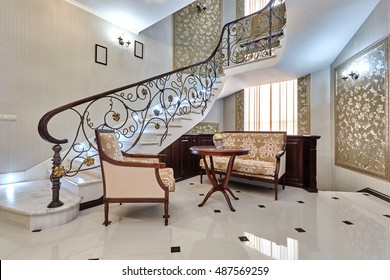 Staircase With Wrought Iron Railing