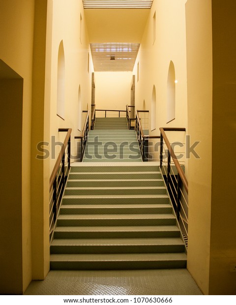 Staircases\
divided into three parts to a higher\
floor
