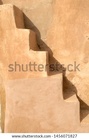 Stairs abstract shape. Stairs marked with shadow. Abstract geometrical background. Tunisian Granery. Old ruins of a building, Ksar Ouled Debbab, Tataouine, Tunisia. Starwars film shooting place