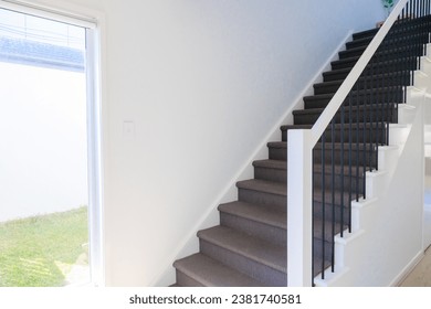 Stairs with brand new white handrails