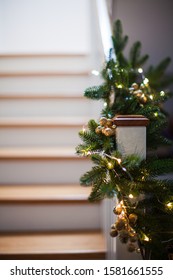 The Stairs Are Decorated In Christmas Style