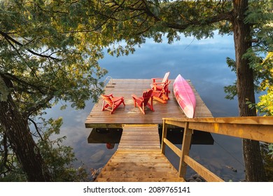 Stairs descend to a lakeside dock - Powered by Shutterstock