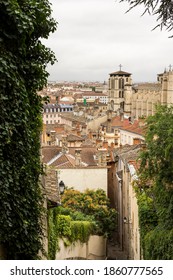 Stairs up the hill of Vieux Lyon to the Basilica Notre Dame de Fourviere and view over the roofs in Old Town of Lyon in France