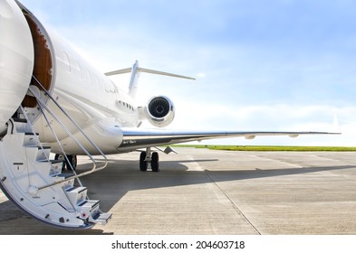 Stairs with Jet Engine on a modern private jet airplane 