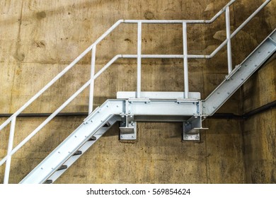 Stairs Leading Up In A Concrete Industrial Setting, They Are The Way Out Of That Room.