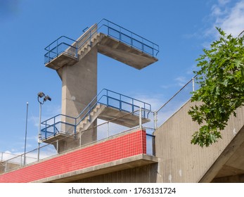 Stairs Leading Up To A High Dive Tower At A World Class Training Swimming Pool On A Sunny Day