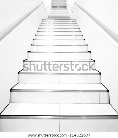 Stairs in modern black and white interior