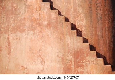 Stairs On An Old Clay Wall