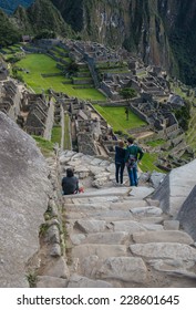 Stairs Of Rocks Down To The Ruins Of Machu Picchu, Peru, South America.