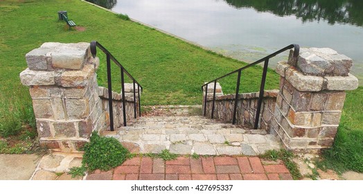 "Stairs at Swan Lake"  -  A stone staircase at Swan Lake in Byrd Park, located in Richmond, VA.  Stairs lead from a road in the park and lead down to the lake below.