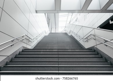 Stairs from underground upward in modern city space. - Powered by Shutterstock