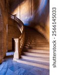 Stairs to the upper floor inside the Palace of Charles V in the Alhambra complex, Granada.