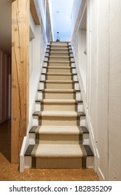 Stairway To Basement In Home Interior With Wood Paneling