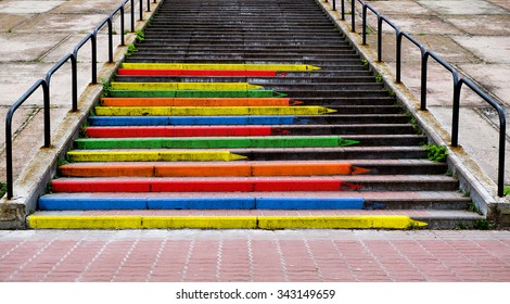 Stairway concept  in the form of pencils of rainbow colors contrasted photo