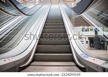Stairway Electric Escalator of Shopping Mall, Perspective View of Empty Luxury Staircase Escalator, Facility Building., Modern Indoor Escalators and Interior Decoration in Shopping Supermarket.