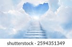 Stairway to Heaven.Stairs in sky. Concept with sun and clouds. Religion background.  Heart shaped clouds. Love background with copy space.
