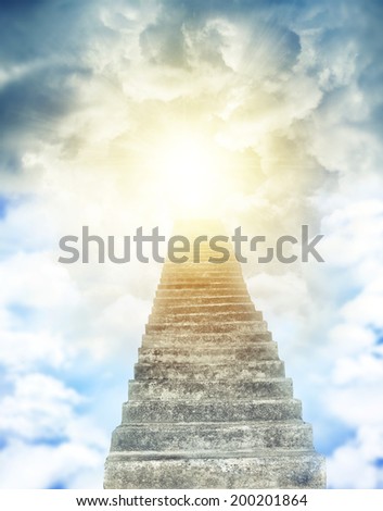 Stairway leading up to bright light 