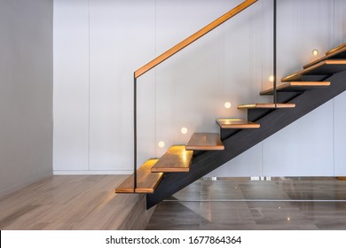 Stairway lights bulb for illumination as safety protection wooden stairs architecture interior design contemporary  Modern house building stairway
