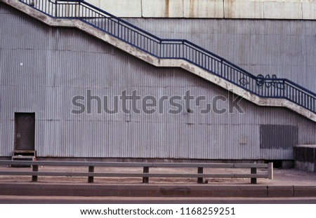 Similar – on patrol Stripe Barrier