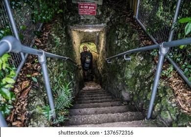 Stairway To The Popular Underground Spring In Williston, Florida With Scuba Diver In Background. The Prehistoric Devil's Den Spring. 