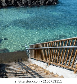 Stairway And Railing To An Ocean Lagoon.  Cover Photograph With Room For Copy With A Nature Theme.