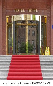 Stairway with red carpet at luxury hotel entrance