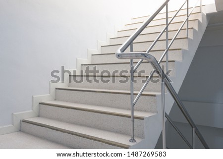 stairwell in the building with handles