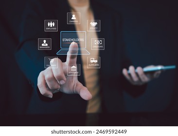Stakeholders concept. Person touching stakeholders icon on virtual screen for business finance stakeholder investment management. Different stakeholders contact collaboration for company organization