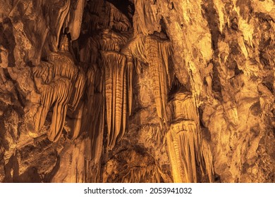 Stalactite Formations Hanging From The Ceiling Of Dim Cave In Alanya, Turkey.