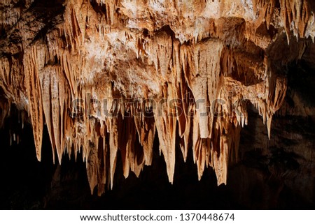 Stalactites hanging from the ceiling of the Gassel-Tropfsteinhöhle cave in Ebensee, Austria