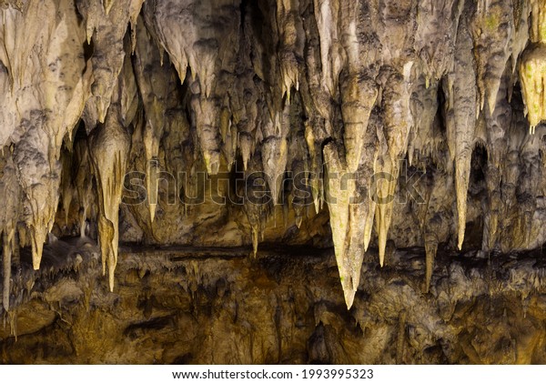 stalactites and stalagmites in large underground\
Cave, Beredine,\
Croatia