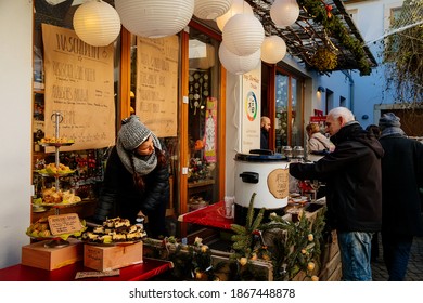 Stalls with Crafts Items. Christmas Market in Art Courtyard Passage artistic spaces in Neustadt district, Kunsthofpassage, Dresden, Saxony, Germany, December 08, 2018 