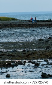 Stamford, CT, USA - October 6, 2017: Dusk Scene Of Men With Fishing Gear Walking At The Park In Stamford Connecticut On October 6th
