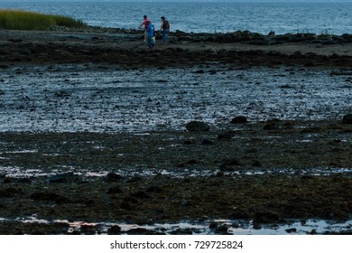 Stamford, CT, USA - October 6, 2017: Dusk Scene Of Men With Fishing Gear Walking At The Park In Stamford Connecticut On October 6th
