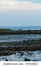 Stamford, CT, USA - October 6, 2017: Dusk Scene Of Men With Fishing Gear Walking At The Park In Stamford Connecticut On October 6th
