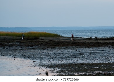 Stamford, CT, USA - October 6, 2017: Dusk Scene Of Men With Fishing Gear Walking At The Park In Stamford Connecticut On October 6th
