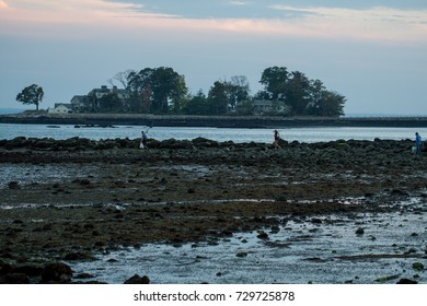 Stamford, CT, USA - October 6, 2017: Dusk Scene Of Men With Fishing Gear Walking At The Park In Stamford Connecticut On October 6th
