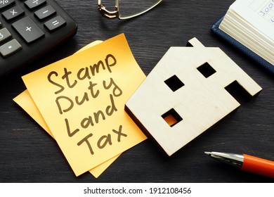 Stamp Duty Land Tax SDLT Memo And Model Of Home.