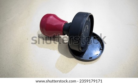 a stamp tool used to validate documents.  good for office equipment reference