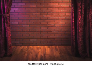 Stand up comedy background, red curtain and a brick wall with a reflector spotlight, high contrast image