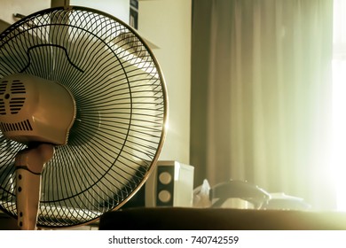 stand electronic fan in room in morning