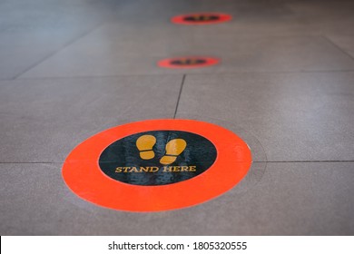 Stand Here Foot Sign Or Symbol On The Floor