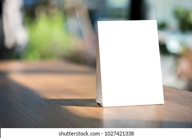 Stand  Mock up Menu frame  tent card  blurred background  design key visual layout. - Shutterstock ID 1027421338