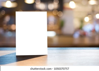 Stand  Mock up Menu frame  tent card  blurred background  design key visual layout ONLINE ADVERTISING - Shutterstock ID 1050370757