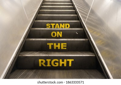 Stand on the right sign on escalator stairs on the London Underground. London - 28th November 2020