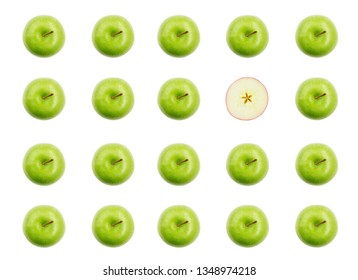 Stand Out Of The Crowd Concept With Green Apples And One Cut Apple Overhead View