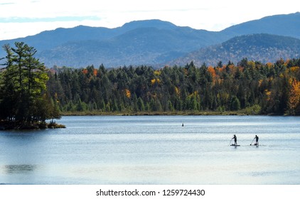 Stand Up Paddle Board Over The Lake