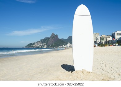 Stand Up Paddle Long Board Surfboard Stuck In The Sand On Ipanema Beach Rio De Janeiro