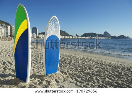 Stand up paddle long board surfboards on Copacabana Beach Rio de Janeiro